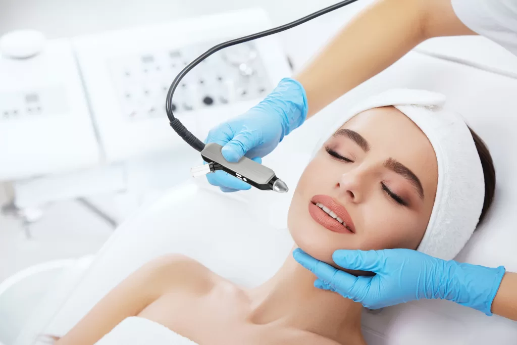 Oxygen facial treatment on face